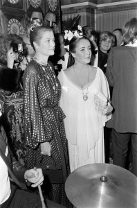 Grace Kelly and Elizabeth Taylor attend a party during Taylor's weekend-long 40th celebration in Budapest, Hungary, in February 1972.